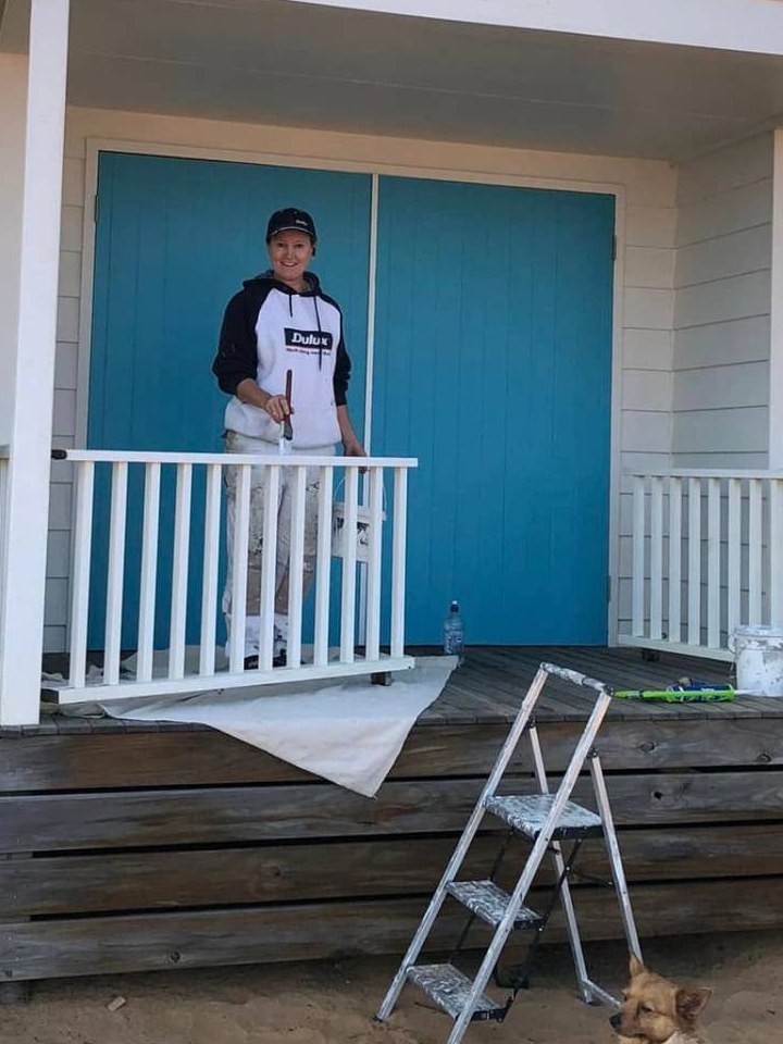Bronwyn Tydeman, director of AquaZen Painting, on a Mornington Peninsula beach box